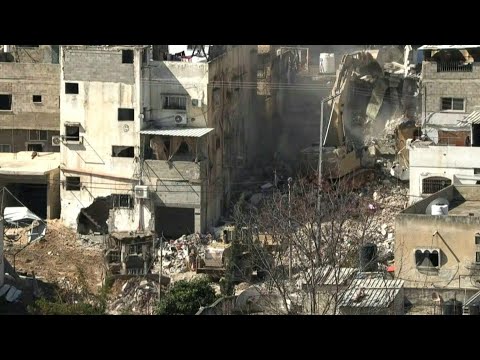 Israeli bulldozers demolish houses during ongoing raid in the West Bank | AFP