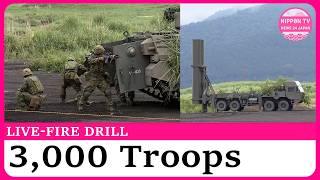 Japan unveils new missile at massive live-fire military drill