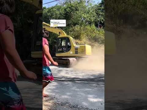 EXCAVATOR FALLS OFF THE TRUCK