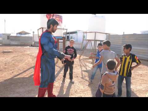 Superman In A Refuggee Camp Shock The Kids - سوبرمان في مخيم اللاجئين