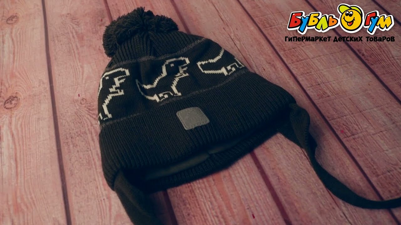 Шапка priKinder зимняя принт динозавры хаки - видео Шапка priKinder зимняя принт динозавры хаки - видео