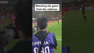 Watching the game from the sidelines