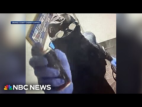 YouTube video thumbnail: Suspect in Diving Gear Robs Restaurant at Disney Springs in Florida