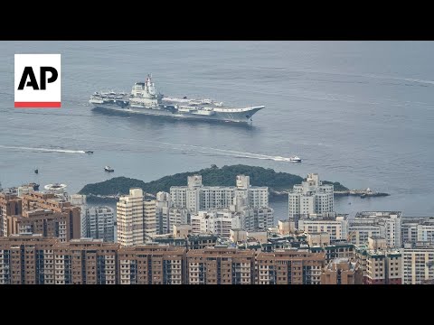 YouTube video thumbnail: Chinese Aircraft Carrier Sails Into Hong Kong for First Time