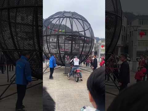 Show stunts on bike inside a round iron cage #shortvideo