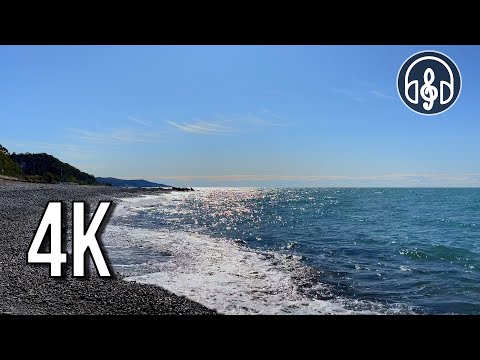 Sounds of sea waves on a cozy pebble beach. 3 hours of 4K video.