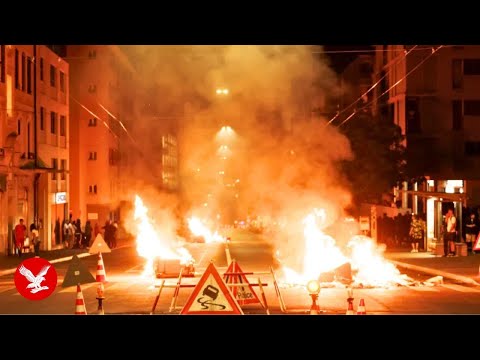 YouTube video thumbnail: Switzerland Riots: Protesters Launch Fireworks at Police After Teenager is Killed in Chase
