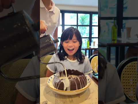 Girl Shocked By Melting Chocolate Ball Surprise