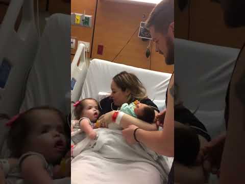 The day our disabled daughter reached out her hand to say hello to her brand new baby brother