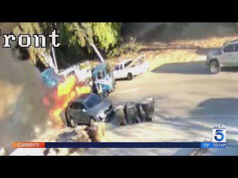 Driver stops truck-on-fire from crashing into O.C. homes