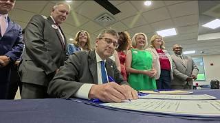 YouTube video thumbnail: New Laws Signed to Curb gun Violence in Delaware