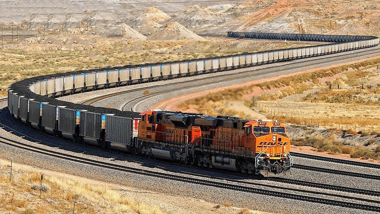Длинные вагоны поездов. Трансгабонская железная дорога Иран. Самый длинный поезд в мире 682 вагона. Железная дорога BNSF. Самый длинный товарный поезд в мире.