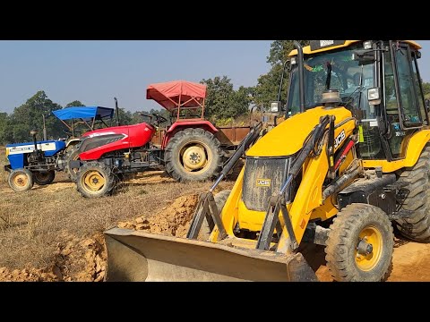 JCB 3DX Backhoe Machine Loading Mud In Mahindra DI And Swaraj Tractor Trolley For Road Construction