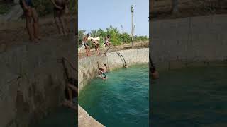 swimming in deep well villages boys having fun in deep well