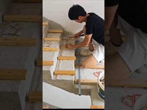 installing wooden floors on building construction stairs #construction #shorts