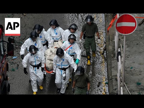 YouTube video thumbnail: Bodies Carried Away After Hong Kong Fire Claims 146 Lives and Sparks Safety Crackdown