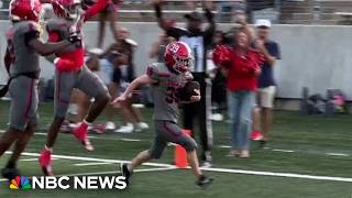 YouTube video thumbnail: Student With Down Syndrome Scores Touchdown During High School Football Game