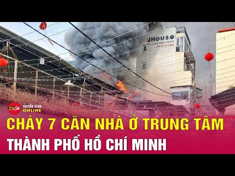 Hiện trường vụ cháy lớn 7 căn nhà ở trung tâm TPHCM chiều 29 Tết | Tin24h