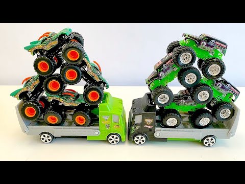 MONSTER JAM BATTLE | DRAGON vs GRAVE DIGGER | TRAVEL TREADS HAULERS  MONSTER TRUCKS