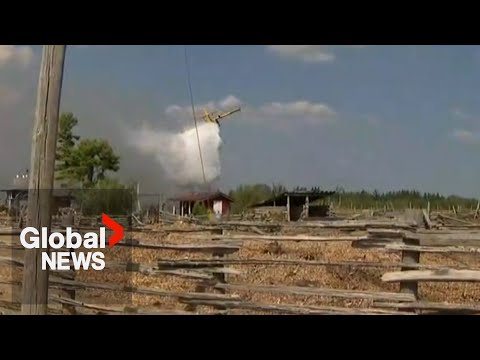 YouTube video thumbnail: Water Bombers, Firefighters Battle Wildfires in Ontario’s Cottage Country