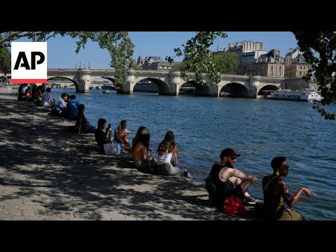 YouTube video thumbnail: Public Swimming in Paris’ Seine River due to Make a Comeback Over a Century After it was Banned