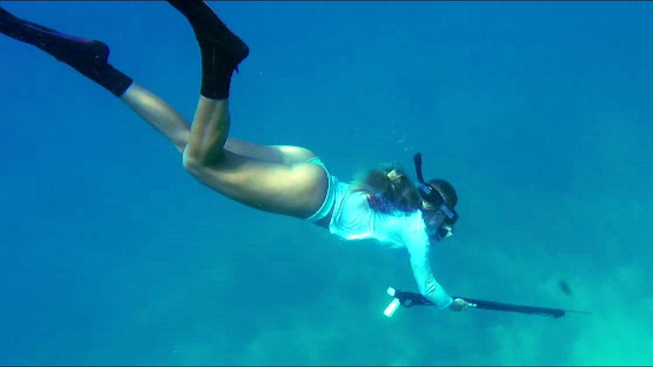 Girl Spearfishing and Diving in Florida Keys