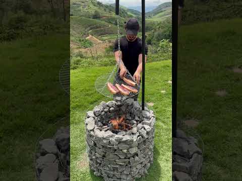 🔥  Built this adjustable BBQ pit with stone and wire .📘 Manual (PDF) — link in bio