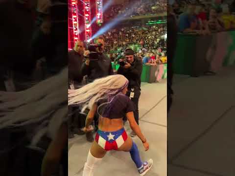 ZELINA KNOCKS FLIP HAT OFF  RING SIDE - WWE