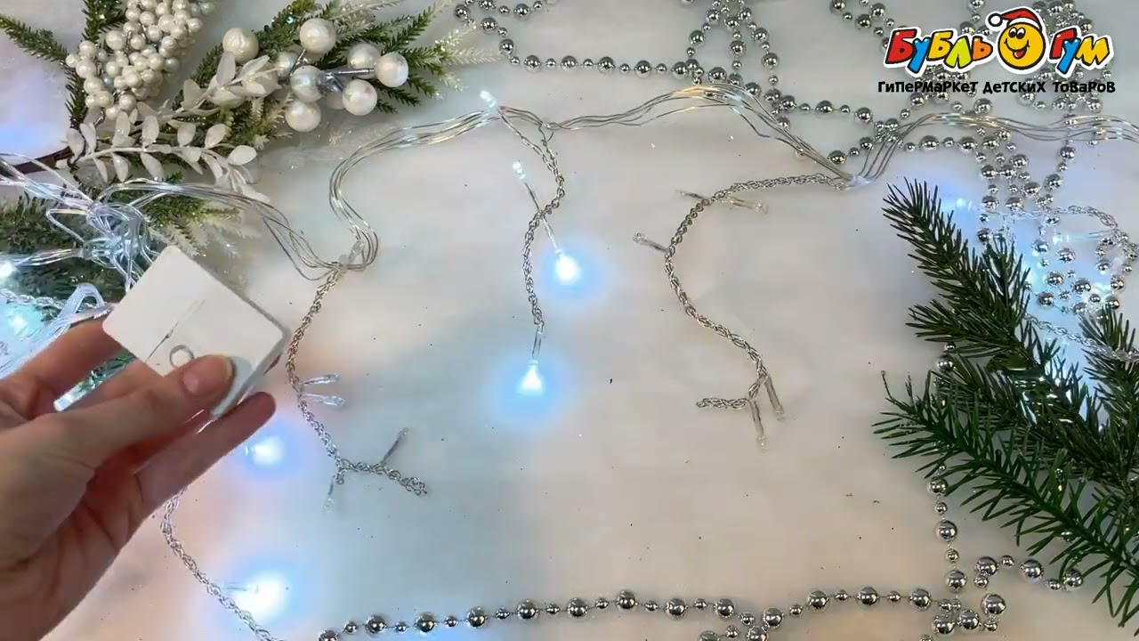 Гирлянда-карниз электрическая с голубым свечением 3м - видео Гирлянда-карниз электрическая с голубым свечением 3м - видео