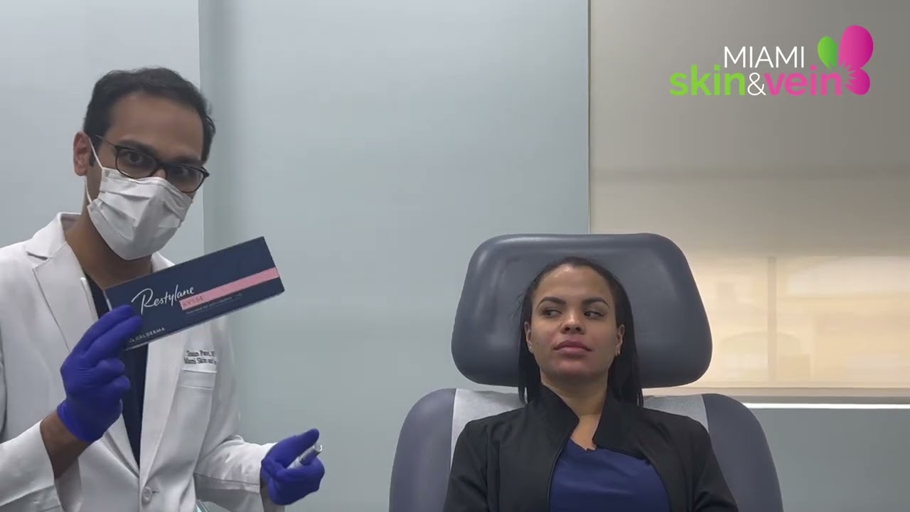 Woman with markings for cosmetic procedure preparation.