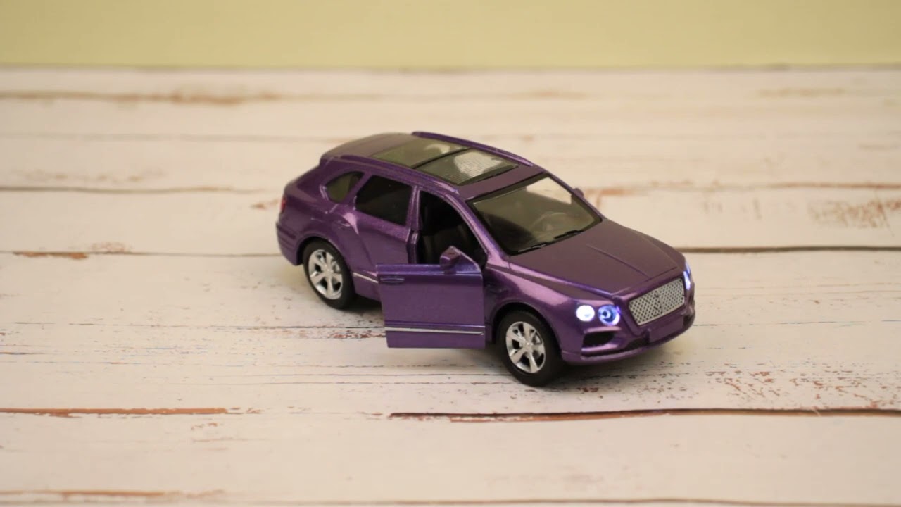 Автомобиль kings toy инерционный световые звуковые эффекты металлический фиолетовый 1:36 - видео