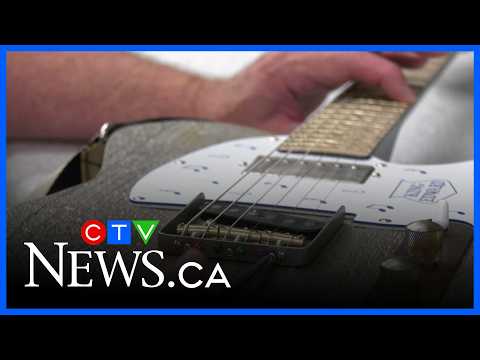 Guitar made from King Eddy exit sign going to National Music Centre