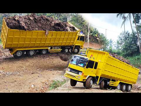 GAGAL OLENG Dump Truk Fuso TRIBAL SILUMAN Truk Hino 500 JEMBER Bermuatan Tanah Truk Terguling