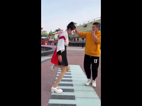 What is the brother doing?