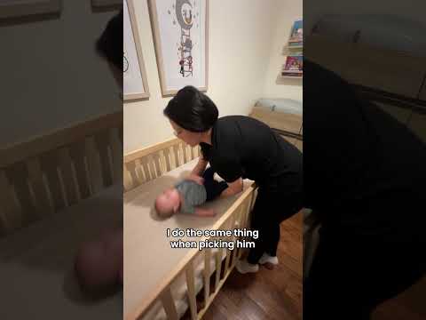 The right way to lift a baby out of a crib