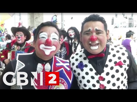 Hundreds of CLOWNS parade through Peru's streets for National Clown Day