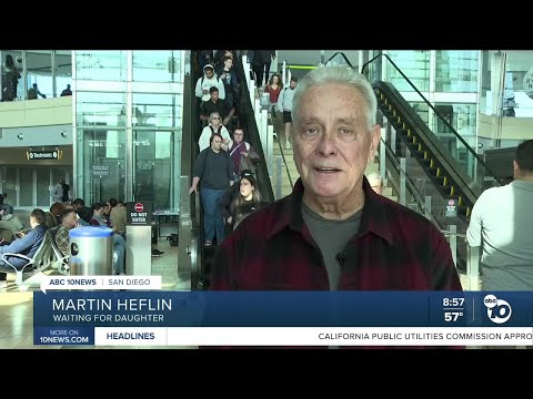 People wait at San Diego International Airport for loved ones as flights are delayed because of fog