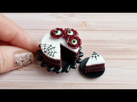 Miniature cake with spider web and flowers with eyes for Halloween🖤❤️🖤Polymer clay