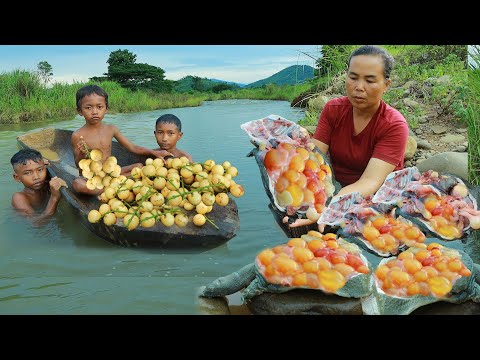 Mountain women eat Burmese grape and cook softshell turtle near the river. It's so yummy.