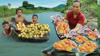 Mountain women eat Burmese grape and cook softshell turtle near the river. It's so yummy.