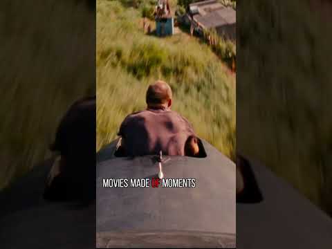 The world's two remaining men shoot people with machine guns in an open-top plane."The Expendables."