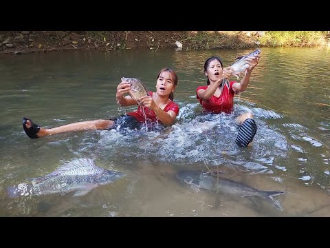 Catch fish in river, Fish salt grilled with Chili sauce for dinner, Eating delicious