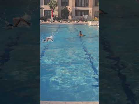 When your daddy thinks he can beat you at your own sport! #thatwasawarmup #swimmer #swimming