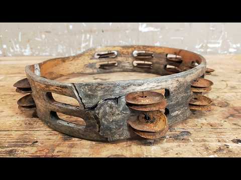 The tambourine. Restoration.