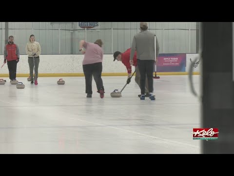 YouTube video thumbnail: Local Businesses Hope to Strike Olympic Curling Gold