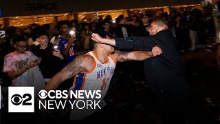 YouTube video thumbnail: Crowd Outside Knicks Watch Party in Bryant Park Turns Violent, Police say