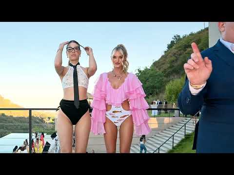 Models Sam & Sylvia wear "Swim with Sharks"  collection by Gold Barr at Beverly Hills Fashion Week