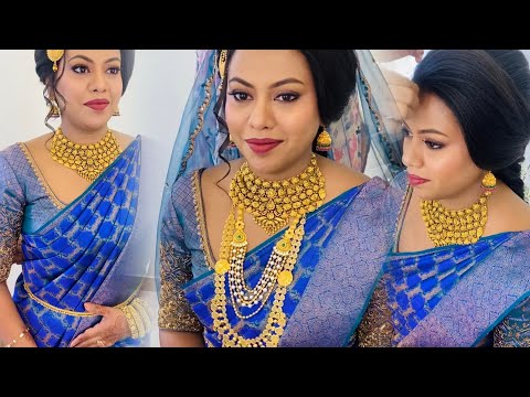 Bride in peacock blue wedding saree, antique gold, braided hair & blue veil, getting ready video.