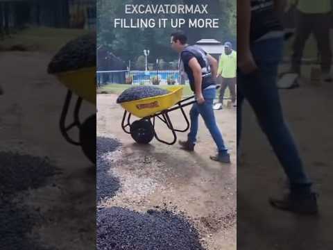 He came right out the office! #viral #hardwork #wheelbarrow #construction