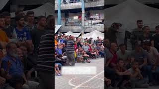 فعاليات كرة الطائرة بالقرب من الشريط الأصفر في مخيم جباليا شمال غزة